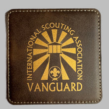 Load image into Gallery viewer, Set of 4 Leather Coasters with logo of Vanguard International Scouting Association